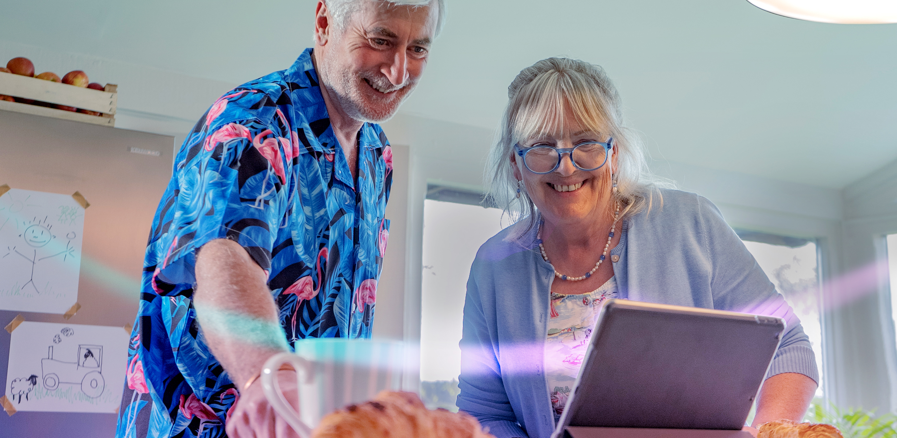 Older Couple with Tablet and Valore Darker for Writing Images