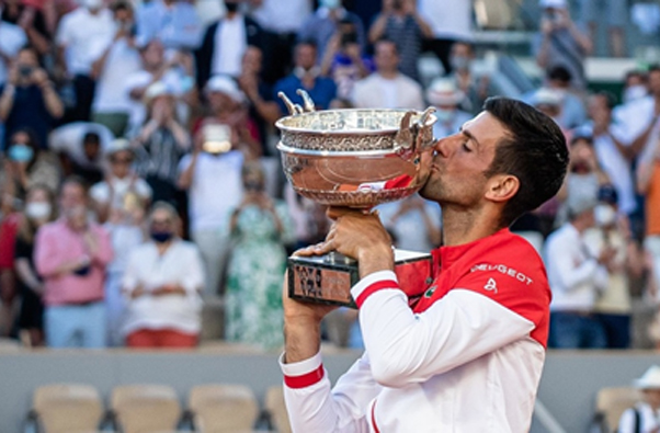 Man Kissing Trophy