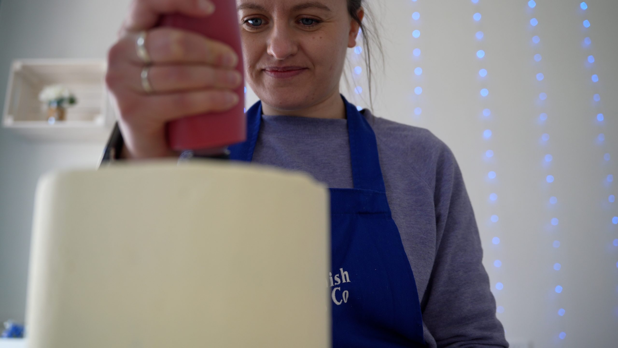 Lady Icing a Cake