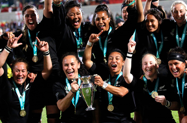 Football Team Winning with Cup